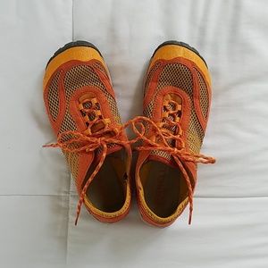 Orange Merrell tennis shoes